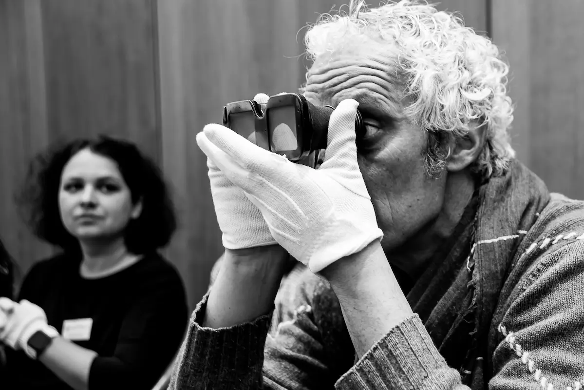 Man with white gloves